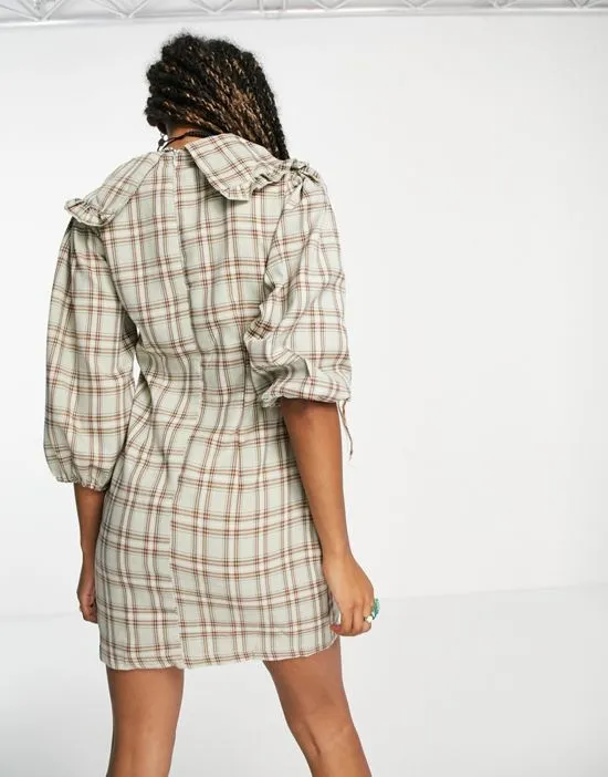 https://images.styletyx.com/images/frill-collar-mini-dress-in-sage-check-heartbreak-2505195_2.webp