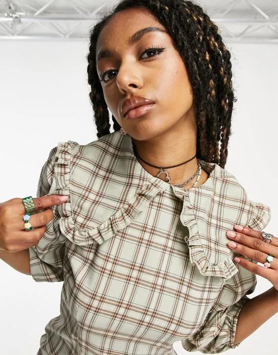 https://images.styletyx.com/images/frill-collar-mini-dress-in-sage-check-heartbreak-2505195_3.webp