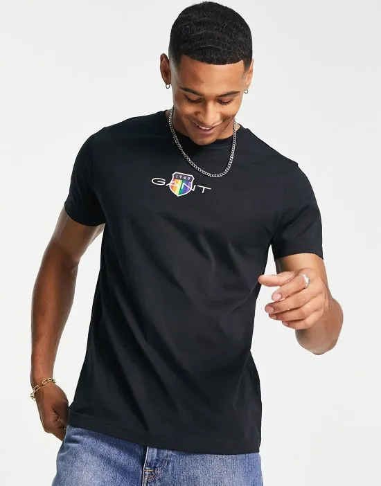 https://images.styletyx.com/images/gant-pride-capsule-shield-logo-t-shirt-in-black-gant-2536946_2.webp