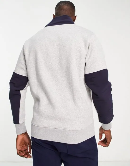 https://images.styletyx.com/images/gant-retro-logo-half-zip-sweatshirt-in-gray-heather-gant-13664157_3.webp
