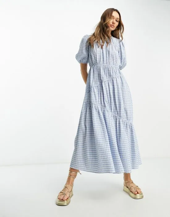 https://images.styletyx.com/images/gathered-tiered-midi-dress-in-blue-picnic-plaid-asos-design-13318214_1.webp