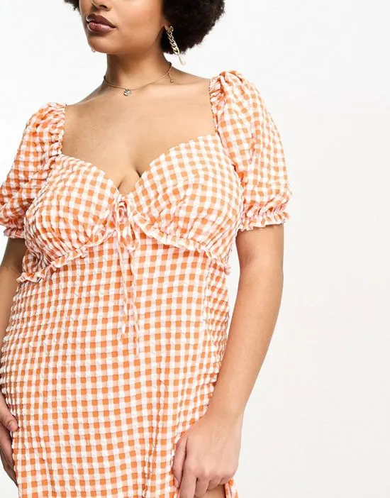 https://images.styletyx.com/images/gingham-ruffle-milkmaid-midaxi-dress-in-tangerine-the-frolic-plus-383621235_2.webp