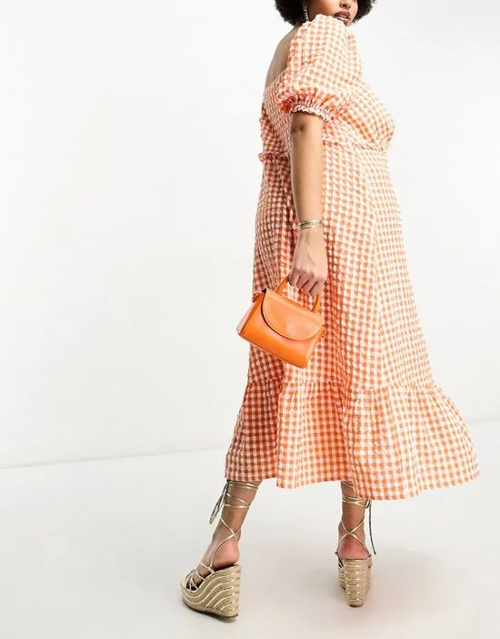 https://images.styletyx.com/images/gingham-ruffle-milkmaid-midaxi-dress-in-tangerine-the-frolic-plus-383621235_4.webp