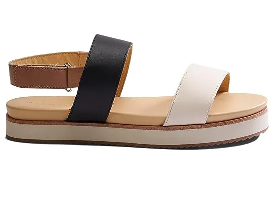 https://images.styletyx.com/images/go-to-flatform-sandal-nisolo-2013752_3.webp