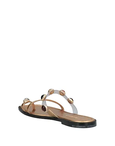 https://images.styletyx.com/images/gold-leather-flip-flops-nodaleto-470506903_3.webp