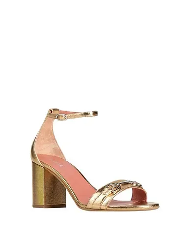 https://images.styletyx.com/images/gold-leather-sandals-bally-873311359_2.webp