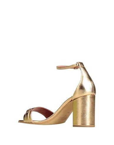 https://images.styletyx.com/images/gold-leather-sandals-bally-873311359_3.webp