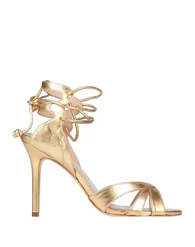 https://images.styletyx.com/images/gold-leather-sandals-gold-rouge-998331310_1.webp