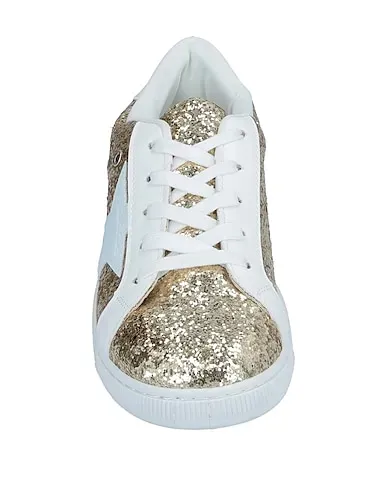 https://images.styletyx.com/images/gold-leather-sneakers-sarah-chole-908634_4.webp