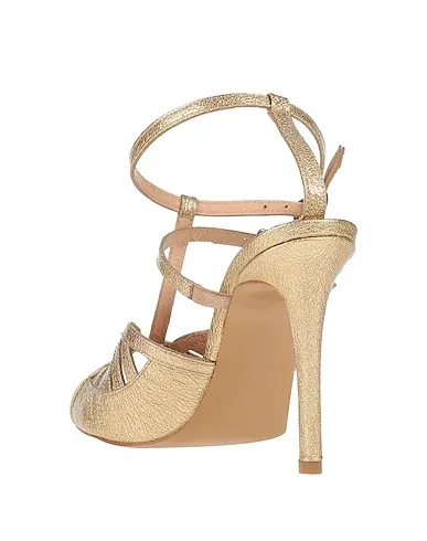 https://images.styletyx.com/images/gold-sandals-nora-new-york-13399470_3.webp