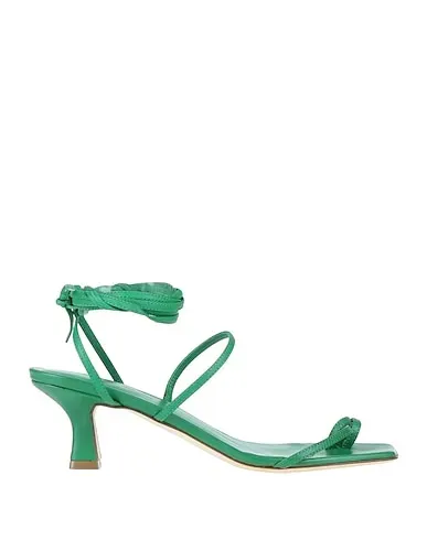 https://images.styletyx.com/images/green-leather-flip-flops-erika-cavallini-2162123_1.webp