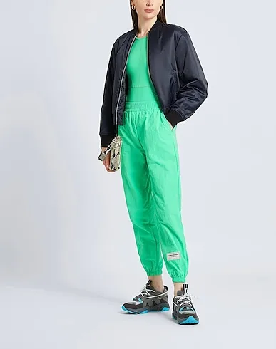 https://images.styletyx.com/images/green-techno-fabric-casual-pants-the-giving-movement-x-yoox-13577747_4.webp