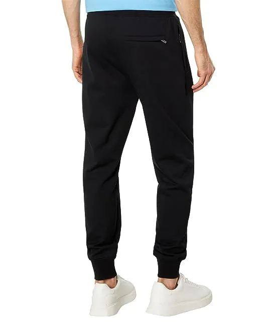 https://images.styletyx.com/images/gresham-embroidered-sweatpants-psycho-bunny-5892226_2.webp