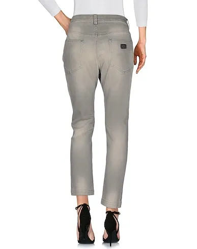 https://images.styletyx.com/images/grey-denim-denim-pants-dolce-gabbana-13233183_2.webp