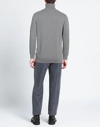 https://images.styletyx.com/images/grey-knitted-turtleneck-jean-paul-67573297_3.webp