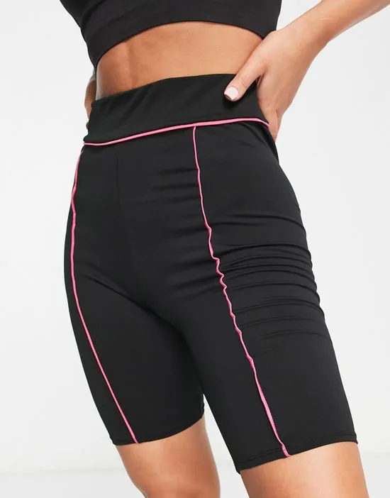 https://images.styletyx.com/images/gym-legging-shorts-with-contrast-piping-in-black-threadbare-fitness-13286148_1.webp