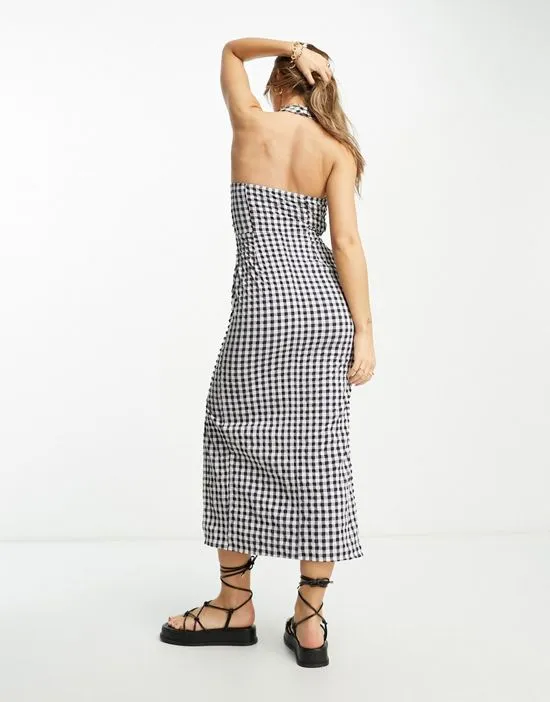 https://images.styletyx.com/images/halter-knot-detail-midi-sundress-in-navy-gingham-asos-design-13208056_2.webp