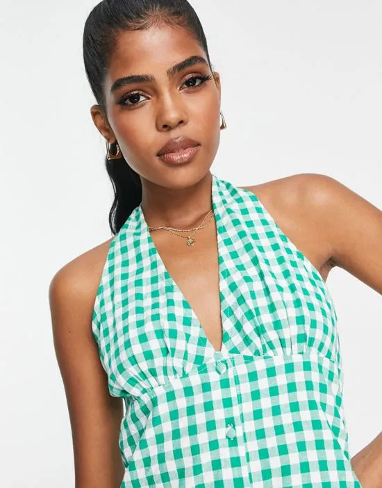 https://images.styletyx.com/images/halter-neck-mini-dress-in-green-gingham-print-influence-3139080_4.webp