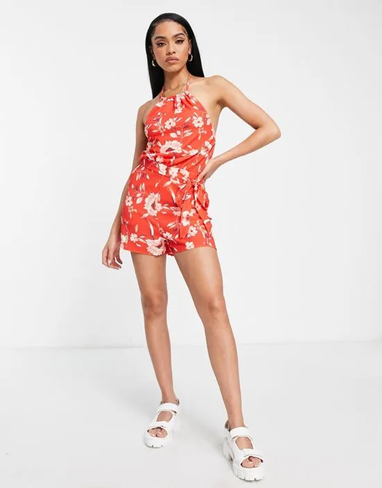 https://images.styletyx.com/images/halter-neck-romper-in-red-floral-parisian-1937542_4.webp