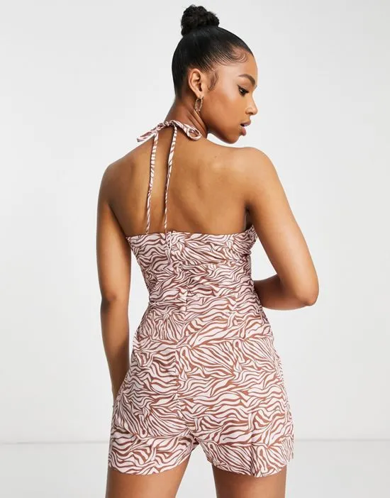 https://images.styletyx.com/images/halter-neck-romper-in-tonal-pink-zebra-wednesday-s-girl-1753406_2.webp