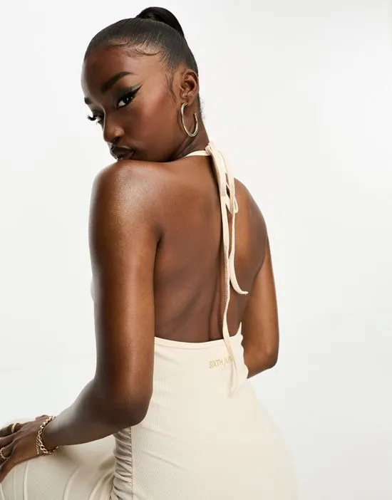 https://images.styletyx.com/images/halterneck-backless-midi-dress-in-beige-sixth-june-873595990_3.webp