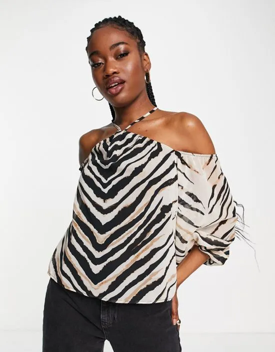 https://images.styletyx.com/images/halterneck-cold-shoulder-top-in-zebra-print-lipsy-1874607_2.webp