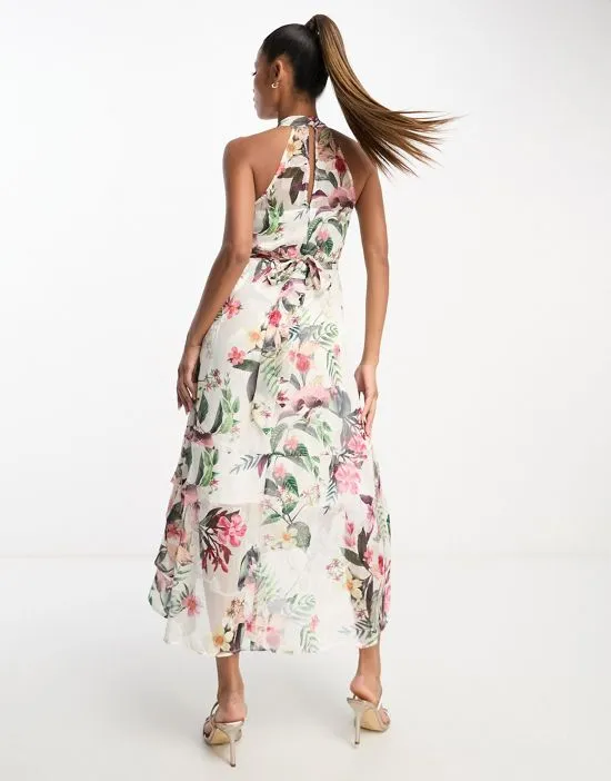 https://images.styletyx.com/images/halterneck-midi-dress-with-wrap-skirt-in-floral-print-lipsy-13169858_2.webp