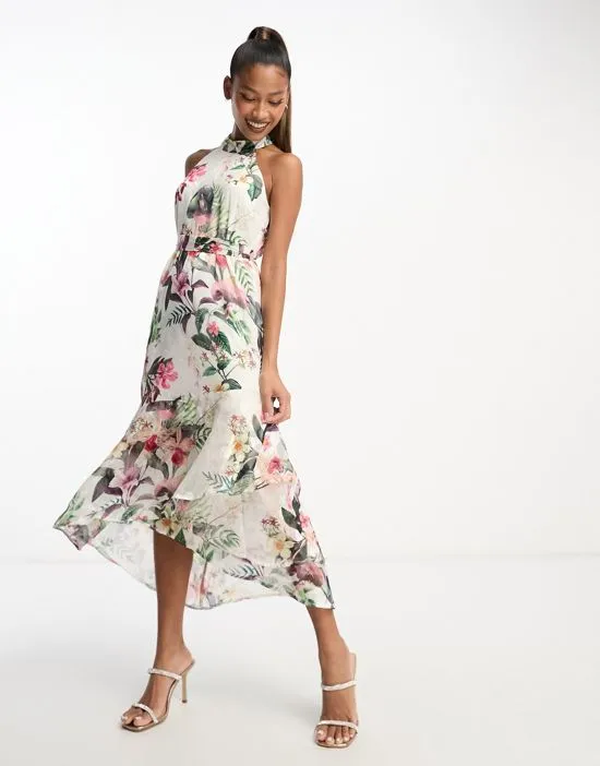 https://images.styletyx.com/images/halterneck-midi-dress-with-wrap-skirt-in-floral-print-lipsy-13169858_4.webp