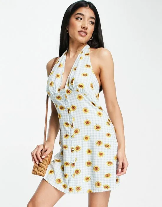 https://images.styletyx.com/images/halterneck-swing-mini-dress-in-sunflower-print-influence-2504682_1.webp