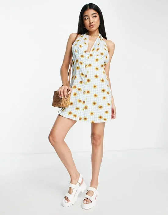 https://images.styletyx.com/images/halterneck-swing-mini-dress-in-sunflower-print-influence-2504682_3.webp