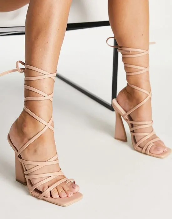 https://images.styletyx.com/images/harperr-strappy-tie-leg-heeled-sandals-in-beige-with-square-toe-bebo-1928073_4.webp