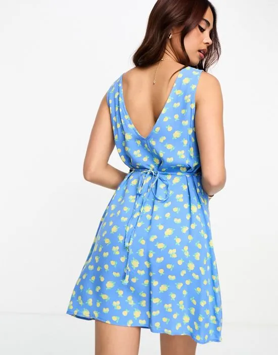 https://images.styletyx.com/images/harriet-lemon-print-mini-dress-in-blue-nobody-s-child-873347998_3.webp