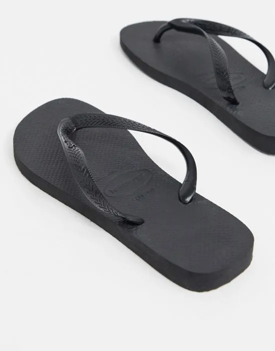https://images.styletyx.com/images/havianas-classic-flip-flops-in-black-havaianas-13660451_2.webp