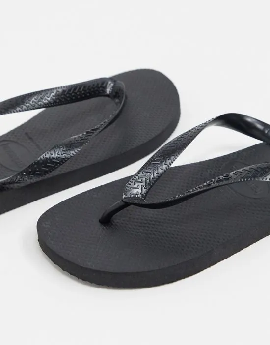 https://images.styletyx.com/images/havianas-classic-flip-flops-in-black-havaianas-13660451_3.webp