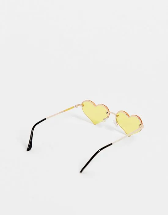 https://images.styletyx.com/images/heart-rimless-sunglasses-in-yellow-jeepers-peepers-13223302_2.webp