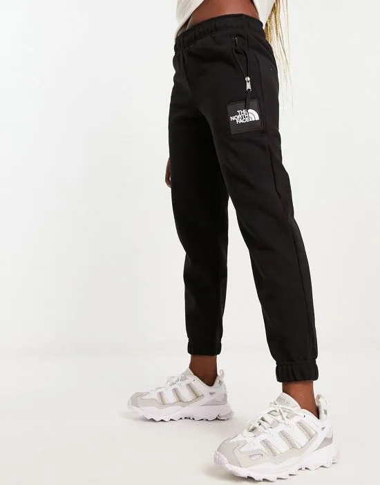 https://images.styletyx.com/images/heavyweight-box-fleece-sweatpants-in-black-the-north-face-13203801_4.webp