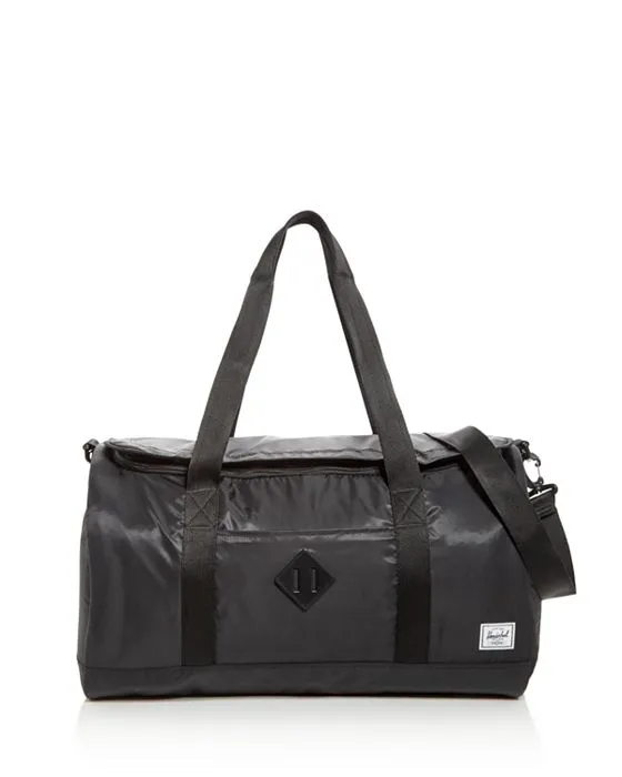 https://images.styletyx.com/images/heritage-duffel-bag-herschel-supply-co-13294744_1.webp