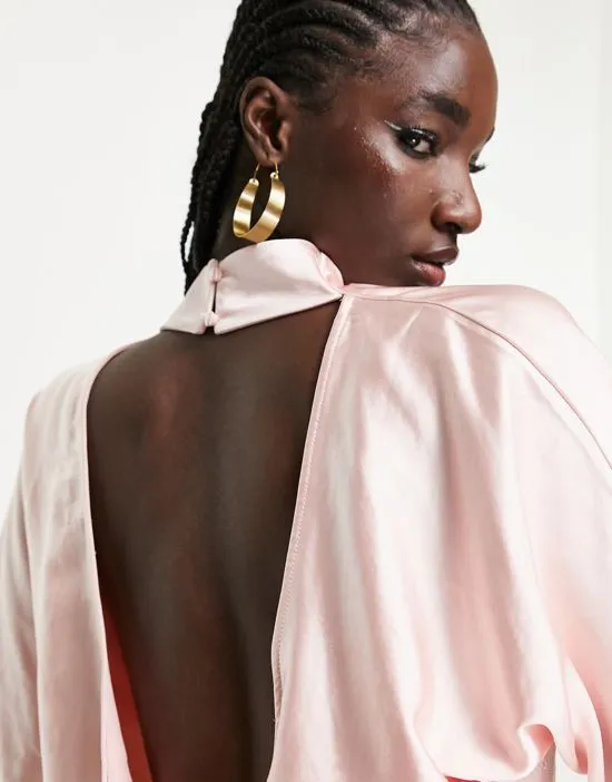 https://images.styletyx.com/images/high-neck-backless-blouse-in-blush-pink-pretty-lavish-1882214_4.webp