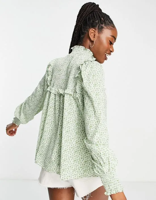 https://images.styletyx.com/images/high-neck-smock-blouse-in-green-floral-glamorous-1893592_2.webp