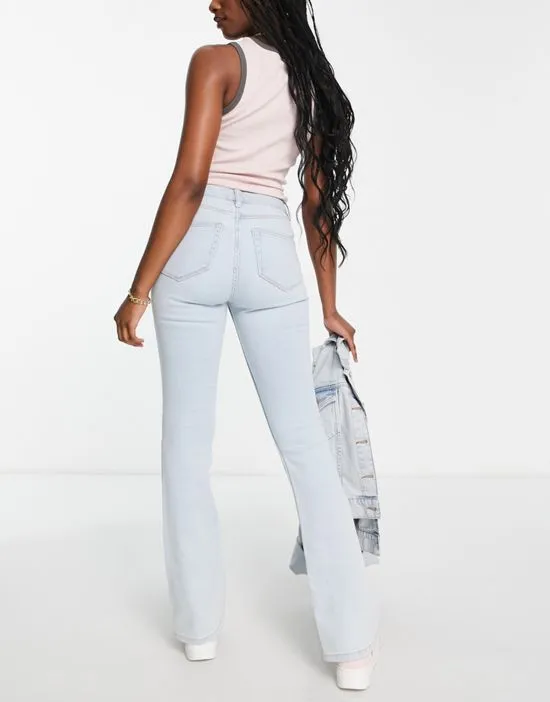 https://images.styletyx.com/images/high-waist-flare-jean-in-bleach-wash-miss-selfridge-1780081_2.webp