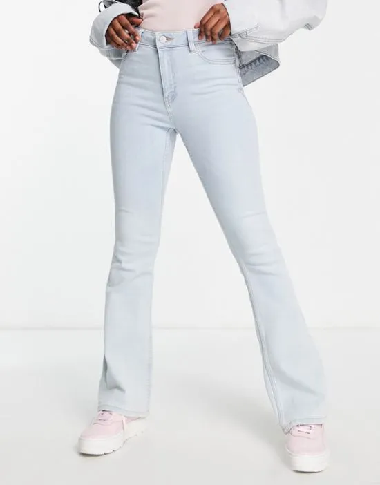 https://images.styletyx.com/images/high-waist-flare-jean-in-bleach-wash-miss-selfridge-1780081_4.webp