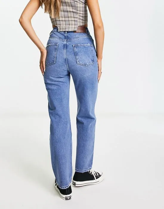 https://images.styletyx.com/images/high-waist-slim-leg-jean-in-washed-blue-reclaimed-vintage-12999258_2.webp