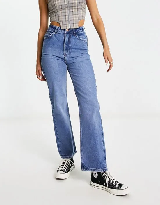 https://images.styletyx.com/images/high-waist-slim-leg-jean-in-washed-blue-reclaimed-vintage-12999258_3.webp
