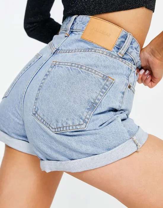 https://images.styletyx.com/images/high-waisted-denim-mom-shorts-in-medium-blue-pull-bear-2767601_3.webp