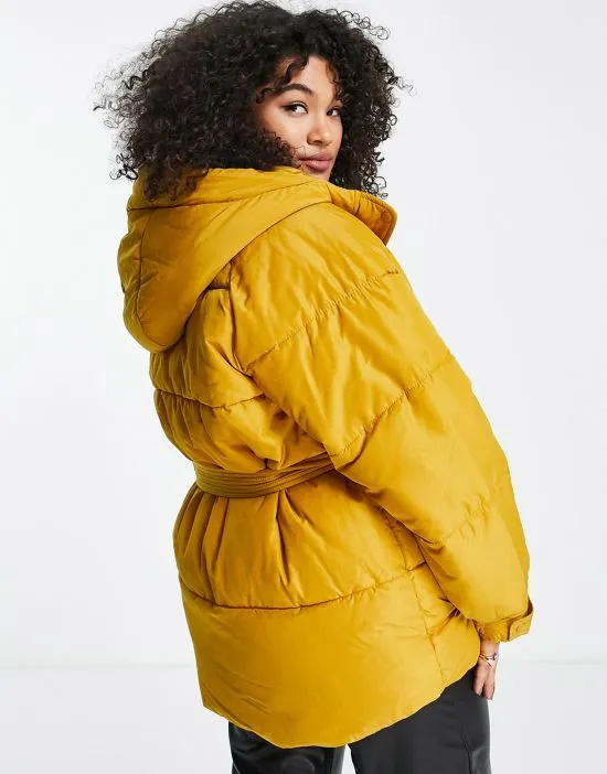 https://images.styletyx.com/images/hooded-padded-jacket-in-rust-vero-moda-curve-360994330_2.webp