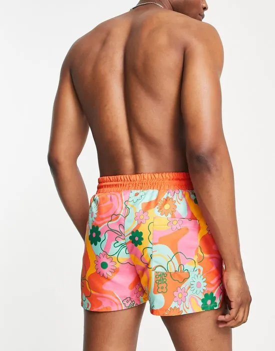 https://images.styletyx.com/images/inspired-runner-swim-short-in-retro-floral-print-reclaimed-vintage-2175954_2.webp