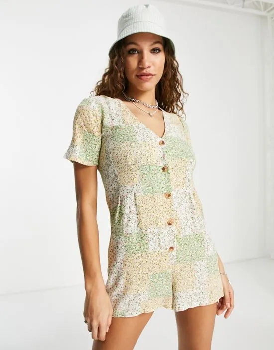 https://images.styletyx.com/images/inspired-slouchy-romper-in-patchwork-floral-print-reclaimed-vintage-1754197_1.webp