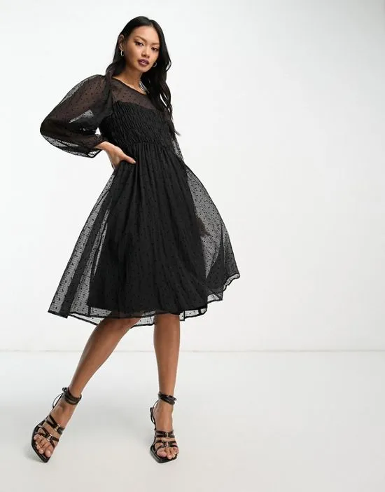 https://images.styletyx.com/images/inwear-aizza-shirred-waist-polka-dot-sheer-dress-in-black-inwear-13240973_1.webp