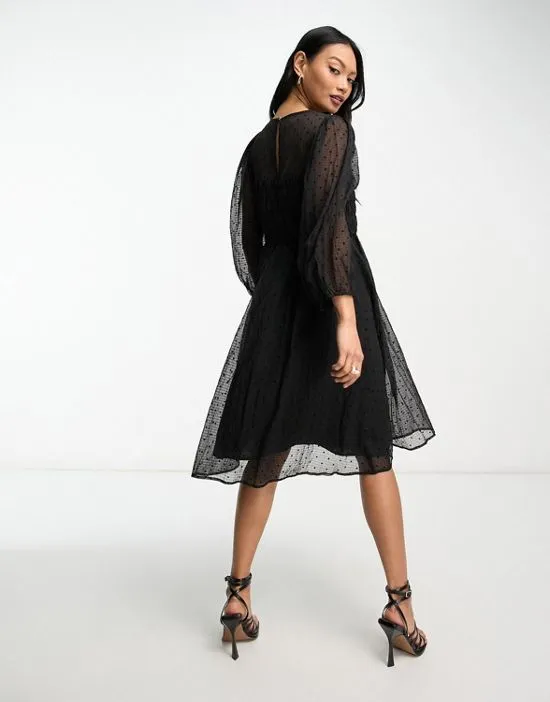 https://images.styletyx.com/images/inwear-aizza-shirred-waist-polka-dot-sheer-dress-in-black-inwear-13240973_2.webp