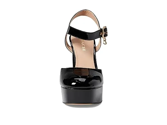 https://images.styletyx.com/images/isabella-patent-leather-pump-coach-13334605_5.webp
